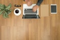 Hipster wooden desktop with laptop, office accessories, flat lay