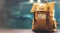 Hipster yellow backpack and map closeup. View from front tourist traveler bag on background blue sea aquarium. Person hiker