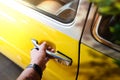 Hipster Young Man Going to Hang Out by Retro Bright Car in Summer