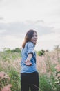 Hipster young woman guiding traveler into the field.