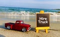 Hire truck text on Black Board. Royalty Free Stock Photo
