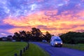 Hired camper driving into a campsite