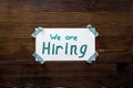 We are hiring - job recruting concept. Words We are hiring on paper banner Royalty Free Stock Photo