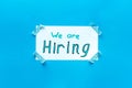 We are hiring - job recruting concept. Words We are hiring on paper banner Royalty Free Stock Photo