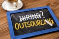 Hiring or outsourcing concept