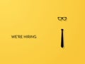 Hiring and recruitment poster or banner vector concept in mimimalist style with tie and glassses. Symbol of vacancies