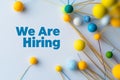 We Are Hiring text with colorful abstract spheres and connecting lines in dynamic design. Modern recruitment announ