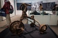 HIROSHIMA, JAPAN - FEB 05, 2018: Rusty and destroyed tricycle from the nuclear explosion site. Piece of Hiroshima peace Memorial M