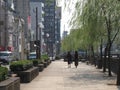 Hiroshima, Japan : October 5, 2015 - Rear view couple of women walking along the pavement with city view background