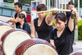 Female japanese drumer playing Taiko - Kumi-daiko performance in Hiroshima, Japan.