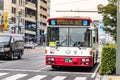 Apanese public bus stopped at the crosswalk line in Hiroshima, Japan. Royalty Free Stock Photo