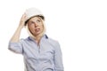 Young woman in a blue shirt and white construction helmet. Isolated over white background. Close-up