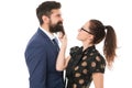 His beard is real. Sensual girl touch hipster beard. Unshaven businessman with long beard hair. Bearded man with stylish Royalty Free Stock Photo