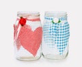 'His and Hers' - two glass jars handecorated Royalty Free Stock Photo