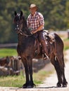 His horse is his best friend. a cowboy sitting on his horse. Royalty Free Stock Photo