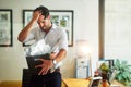 His worst fears have come true. a stressed businessman holding his box of possessions after getting fired from his job. Royalty Free Stock Photo