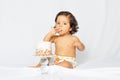 hispanic baby smash the cake photo shoot Royalty Free Stock Photo