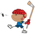 Hispanic boy playing hockey