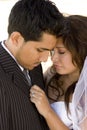 Hispanic bride and groom on their wedding day.