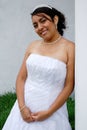 Hispanic bride waiting in the car