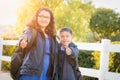 Hispanic Brother and Sister Giving Two Thumbs Up Royalty Free Stock Photo