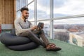 Hispanic Business Man Using Tablet Computer Sit n Front Panoramic Window Happy Smiling Businessman Royalty Free Stock Photo