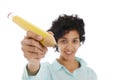 Hispanic business woman holding huge yellow pencil