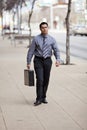 Hispanic Businessman - Walking With Briefcase Royalty Free Stock Photo