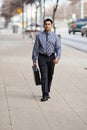 Hispanic Businessman - Walking With Briefcase Royalty Free Stock Photo