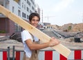 Hispanic carpenter at work on construction site