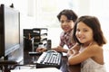 Hispanic children using computer at home