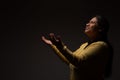 Hispanic Christian Woman Praying with Open Arms