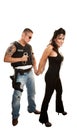 Hispanic cop arresting pretty woman Royalty Free Stock Photo
