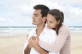 Hispanic couple bonding on beach Royalty Free Stock Photo