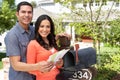 Hispanic Couple Checking Mailbox