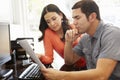 Hispanic couple working in home office Royalty Free Stock Photo