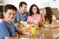 Hispanic family eating breakfast Royalty Free Stock Photo