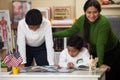 Hispanic Family in Home-school Setting Studying Rocks Royalty Free Stock Photo