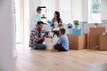 Hispanic Family Moving Into New Home Royalty Free Stock Photo