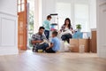 Hispanic Family Moving Into New Home Royalty Free Stock Photo