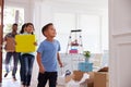 Hispanic Family Moving Into New Home