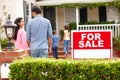 Hispanic family outside home Royalty Free Stock Photo