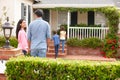 Hispanic family outside home for rent Royalty Free Stock Photo