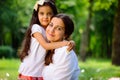 Hispanic family playing in sunny park