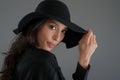 Hispanic fashion model posing at studio. Close up portrait.