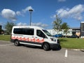 A Hispanic Federation van outside a meeting venue