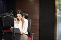 Hispanic female radio presenter at studio