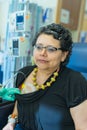 Hispanic Female Waits Pateintly During Chemo Treatment Infusion