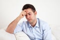 Hispanic guy in a blue shirt feels sad Royalty Free Stock Photo