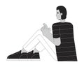 Hispanic guy sitting on floor black and white 2D line cartoon character